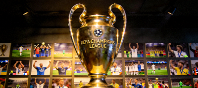 欧冠联赛奖杯特写与赛事历史照片墙